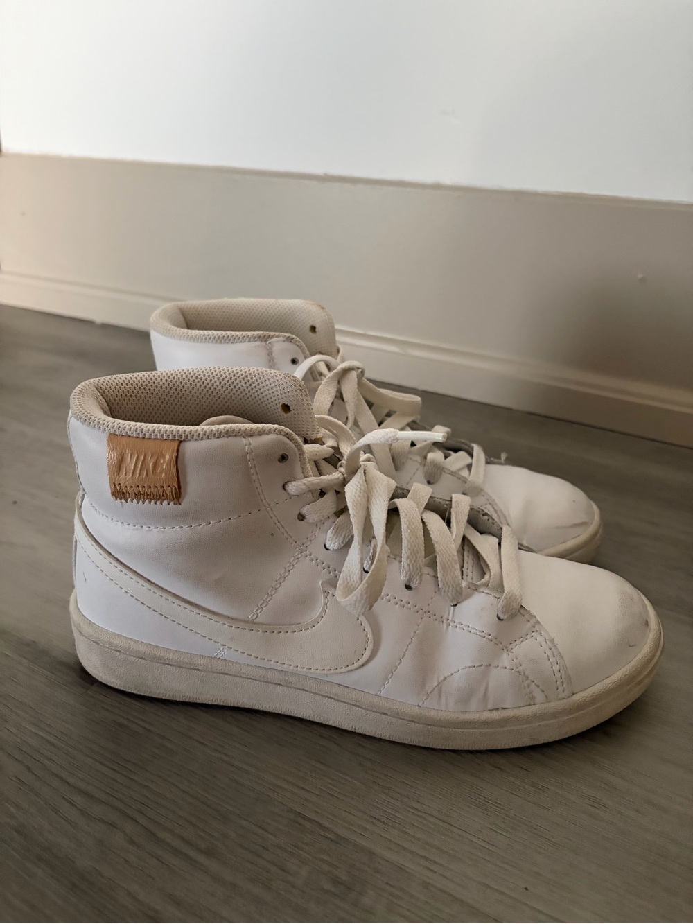 Nike White High-Top Sneakers with Tan Patch